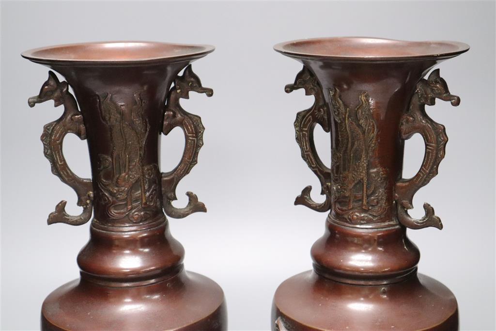 A pair of Chinese vases, dragon handles, height 33cm